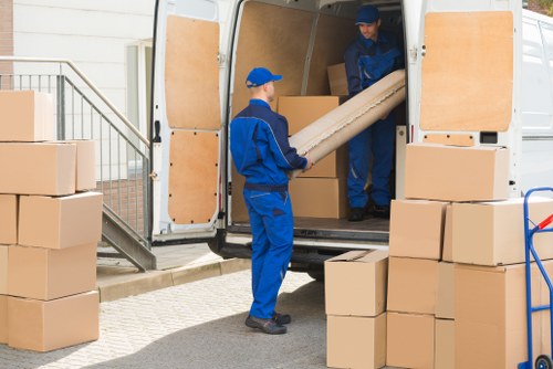 Professional flat removals in Uppernorwood with moving van and packed boxes