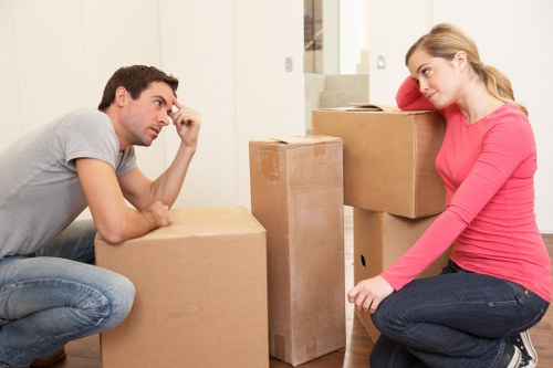 Professional movers handling furniture during a house removal in Upper Norwood